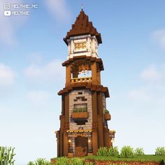 a very tall tower with a clock on it's side in the middle of a field