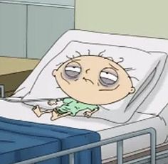 a cartoon character laying in a hospital bed