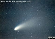 an image of a white object in the sky with stars around it and text that reads, photo by kevin doley via flickr