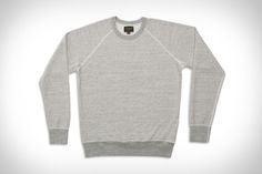 Made from fabric woven exclusively for National Athletic Goods, this sweatshirt is inspired by vintage athletic gear from the mid-20th century. The classic look never... Athleisure Cotton Sweatshirt With Raglan Sleeves, Cotton Athleisure Sweatshirt With Raglan Sleeves, Sporty Cotton Sweatshirt With Raglan Sleeves, Sporty Cotton Sweater For Everyday Use, Classic Relaxed Fit Sweats, Everyday Cotton Sweats With Ribbed Cuffs, Cotton Athleisure Sweatshirt For Everyday, Cotton Crew Sweatshirt With Double-needle Stitching, Sporty Loungewear Sweatshirt