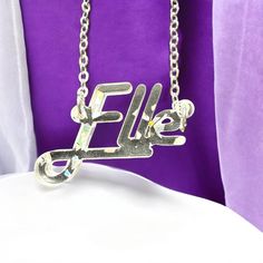 This Personalized Name Necklace is a custom script gift that makes for an ideal birthday, Christmas, Mother's Day, or graduation present. The silver pendant features a stylish script design, creating a versatile women's accessory jewelry piece that's perfect as a gift for mom, best friends, or any special woman in your life. 🎁 𝐂𝐮𝐬𝐭𝐨𝐦𝐢𝐳𝐚𝐛𝐥𝐞 𝐒𝐜𝐫𝐢𝐩𝐭 𝐍𝐚𝐦𝐞 𝐍𝐞𝐜𝐤𝐥𝐚𝐜𝐞: 𝐀 𝐓𝐡𝐨𝐮𝐠𝐡𝐭𝐟𝐮𝐥 𝐆𝐢𝐟𝐭 𝐟𝐨𝐫 𝐄𝐯𝐞𝐫𝐲 𝐎𝐜𝐜𝐚𝐬𝐢𝐨𝐧  * 14K and 18k Gold & Silver Plated C Aunt Niece, Script Design, Name Necklace Silver, Niece Gifts, Accessory Jewelry, Daughter Mother, Nameplate Necklace, Gift For Daughter, Custom Name Necklace