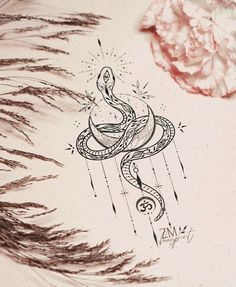 a drawing of a snake on the side of a wall next to flowers and feathers