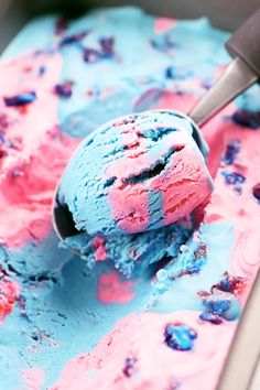 a scoop of blue and pink ice cream