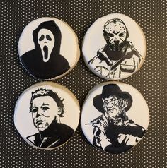 four buttons with the faces of three different characters on them, one is wearing a mask