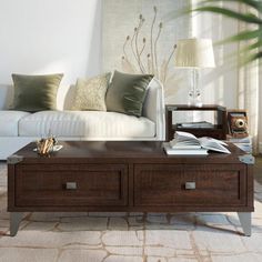 a living room with a white couch and coffee table