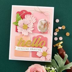 a close up of a card with flowers