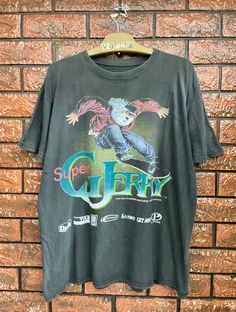 Vintage 90s Gasper Brother "Oldman Ollie" Skateboard Promo T Shirt / Old Skate / 90s Streetwear T Shirt Made In Usa Size L Condition : Good Used Size on tag : L Colour : Black Brand : Unknown Measurement : Armpit to armpit - 22.5" Length - 26.5" Material : Old Cotton Made In: USA  THE SHIPPING (Your Choice Please read) 1. The shipping cost is USD 20 via Malaysian Registered Postage With Tracking Number. It will take 2-4 weeks or more for delivery, depends on your custom checking. 2. Add USD 10 f 90s Crew Neck T-shirt For Skateboarding, Vintage Short Sleeve T-shirt For Skateboarding, Vintage Screen Print Tops For Skateboarding, 90s Graphic Print Tops For Skateboarding, 90s Vintage Print T-shirt For Streetwear, Ollie Skateboard, Skate T Shirts, Streetwear T Shirt, 90s Streetwear