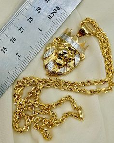 18k Real Gold Lion Necklace ,18.58 gr, 4MM Rope chain 23.5" Inches with lobster clasp . [Please text me if you want different size of chain .] Symbol of King Lion Head is symbols of rank, leadership and power in traditional cultures whose chiefs, kings and high status male leaders wear necklaces of lion Head to symbolize their rank and authority in society. Lion Head should be handled and worn with much respect. Priced to sell! Compare our prices to other similar sellers! Arrives in a GIFT BOX and includes FREE SHIPPING within the USA and Canada. International shipping is available at the most economical rates on ETSY. I HAVE BEEN IN THE JEWELRY BUSINESS ALL MY LIFE. I am a second -generation family member making gold and jewelry. Please feel free to ask me any questions - Always happy to King Lion, Lion Necklace, Gold Lion, Gold Rope Chains, Wear Necklaces, Lion Head, Jewelry Business, Rope Chain, Real Gold