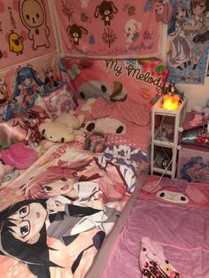 a bed with pink sheets and stuffed animals on the comforter, next to a night stand