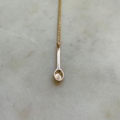 Small Handcrafted Bronze Spoon Pendant On Gold-Filled Necklace Chain Cake Pull Charms, Silver Market, Spoon Necklace, South Louisiana, Food Bank, Birthstone Bracelets, Birthstone Earring, Creamy Peanut Butter, Gold Price