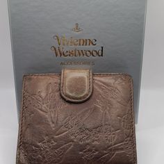 Used Vivienne Westwood Brown Leather Wallet With Box. This Wallet Has Light Wear Around The Edges But Is Still Beautiful. The Embossed Pattern Is Very Cute. Please See All Pictures. Vivienne Westwood Bags, Embossed Pattern, Brown Leather Wallet, Vivienne Westwood, Leather Wallet, Brown Leather, Wallets, Bag Lady, Wallet