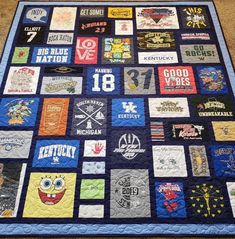 a quilt made to look like it has many different patches and numbers on the front