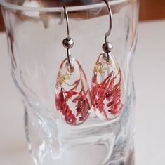 Flower earrings, real red flowers, gift for her, unique nature present covered in resin for woman, wife, mother, sister or girlfriend, steel Dangle Flower Earrings With Natural Inclusions As Gift, Dangle Earrings With Natural Inclusions For Gift, Resin Birth Flower Drop Earrings, Resin Drop Earrings With Birth Flower Design, Botanical Drop Earrings With Pressed Flowers, Botanical Style Drop Earrings With Pressed Flowers, Botanical Pressed Flowers Drop Earrings, Earrings Real, Botanical Earrings