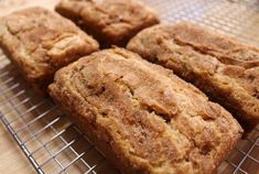 some food that is sitting on a wire rack with the words, snickkeddoodle bread