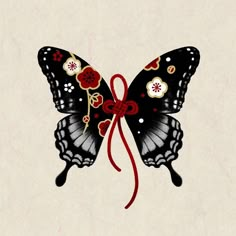 a black butterfly with red and white flowers on it's wings