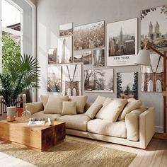 a living room filled with furniture and lots of pictures on the wall above it's coffee table