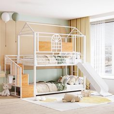 there is a bunk bed with a slide on the floor and a teddy bear next to it