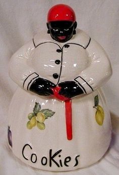 a ceramic cookie jar with a chef on it's face and the words cookies written in black