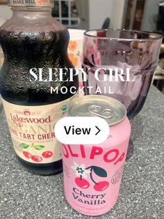 a bottle of booze next to a can of cherry soda and a glass with the word sleepy girl mochail on it