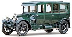 an old green car is shown on a white background