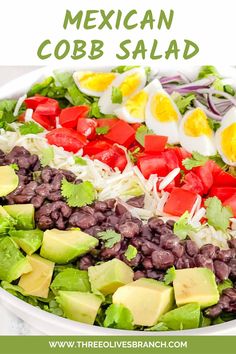 mexican cobb salad with black beans, avocado, tomatoes and hard boiled eggs