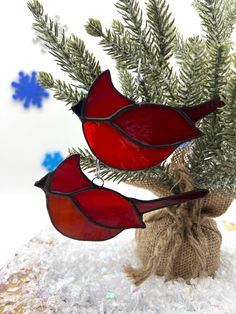 Bring the beauty of nature to your tree with these vibrant stained glass cardinal ornaments. Handmade with rich red glass and copper accents, these cardinals are perfect for holiday decor or year-round charm. Stained Glass Nutcracker, Stained Glass Cardinal Pattern, Fused Glass Cardinal, Christmas Stained Glass Ideas, Stained Glass Christmas Ornaments, Wine Bottle Decorations, Stained Glass Christmas Tree, Christmas Stained Glass, Stained Glass Cardinal