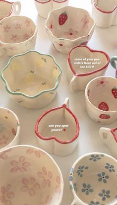 many bowls and spoons are on the table with words written in small letters that read, can you spot your heart?