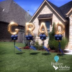 balloons that spell out the word crap in front of a house