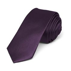 This eggplant purple solid color skinny tie is part of our trendiest line of neckties. It features a 2-inch width, just like what all the young celebrities are wearing. A satin finish provides an extra sharp look.We recommend this shade for a muted deep purple color. Product Features • Skinny 2" width, at the widest point • 57" length, tip to tip• Color is eggplant purple • Made from 100% Polyester • Satin finish • Dry clean only • Imported Purple Fitted Suit And Tie Accessories For Groom, Formal Lavender Fitted Suit And Tie Accessories, Purple Standard Tie For Black Tie Events, Elegant Purple Suit And Tie Accessories For Groom, Fitted Purple Tie For Groom, Classic Purple Adjustable Suit And Tie Accessories, Elegant Purple Ties For Groom, Elegant Purple Wedding Ties, Black Groomsmen Suits