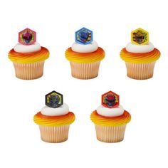 six cupcakes with frosting and designs on them are arranged in the shape of hexagonal figures