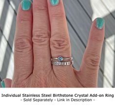 "PLEASE READ THE WHOLE DESCRIPTION BEFORE ORDERING - Custom orders are not returnable. This line of stainless steel rings (sizes 5-11) are hand stamped one metal stamp at a time using the name or initials of your choice (on the outside of the ring only)! Stamping pushes into the metal creating divots that are then filled with black paint. This is a different method than engraving. Since hand stamping is handmade, it won't be completely straight or some letters might be deeper than others; if tha Adjustable Stackable Rings As Gift, Adjustable Stackable Stainless Steel Rings, Adjustable Stackable Birthstone Ring For Anniversary, Hypoallergenic Promise Stackable Round Rings, Hypoallergenic Promise Stackable Rings, Mother's Day Promise Stackable Rings, Nickel Free Adjustable Stackable Rings For Promise, Nickel Free Adjustable Stackable Promise Rings, Nickel-free Adjustable Stackable Promise Rings