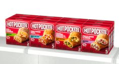 three boxes of hot pockets are on display