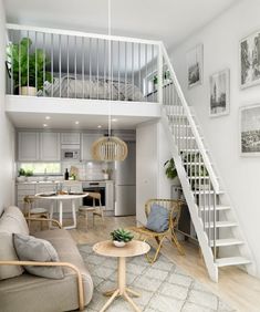 a living room filled with furniture and a stair case