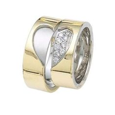 two tone gold wedding rings with diamonds on each side and an open heart in the middle