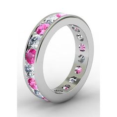 a white gold ring with pink and clear stones on the inside, set in 18k white gold