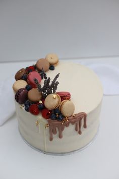 a close up of a cake with icing and decorations on it's side