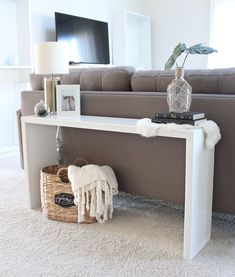 a living room with a couch and table in it