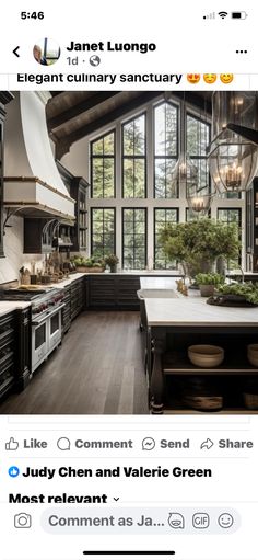 an instagramted photo of a kitchen with lots of counter space and large windows