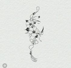 a black and white drawing of flowers on paper