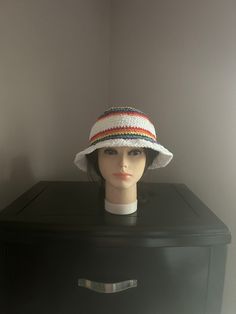 Hand crochet Rainbow bucket hat.  Crochet with 100% cotton yarn. Fits an average size head.  Gender neutral. Size: 21 x 8.5 Custom orders welcome. . White Bucket Mini Hat One Size, White Bucket Hat Mini Size, Handmade White Crochet Hat With Short Brim, White Brimmed Hat One Size, White Handmade Casual Straw Hat, Casual White Handmade Straw Hat, White Crochet Bucket Hat For Vacation, White Adjustable Crochet Bucket Hat, Adjustable White Crochet Bucket Hat