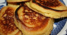 some pancakes on a blue and white plate