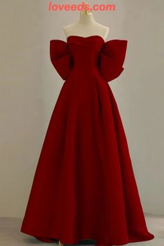 red bow evening dress Chic Solid Color Evening Dress For Banquet, Elegant Evening Dress With Bow For Banquet, Solid Color Formal Gown For Prom Season, Formal Solid Color Gown For Prom Season, Elegant Strapless Gown With Bow, Elegant Evening Dress With Red Bow, Elegant Prom Gown With Bow, Chic Red Evening Dress For Banquet, Kelvin Klein