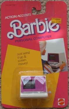 an action figure is in the package for barbie's computer game, barbies