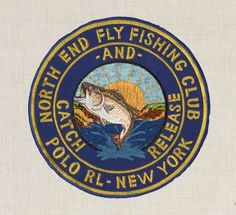 the north end fly fishing club logo is shown in blue and gold on a white background