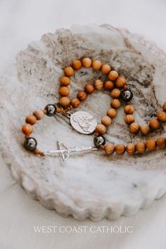 These wooden and metal beads represent Mount Sinai, where the prophet Moses received the Ten Commandments in Deuteronomy and Exodus. Prophet Moses, Mount Sinai, The Ten Commandments, Ten Commandments, The Prophet