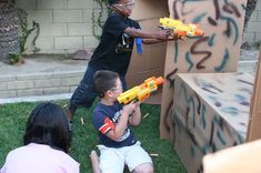 Picture of How to throw a Nerf Battle Birthday Party Building shooting forts Battle Party, Army Birthday Parties, Army Birthday, Camo Party, Nerf Birthday Party, Army Party, Nerf Party, 9th Birthday Parties, 10th Birthday Parties