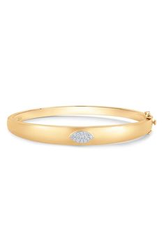 This sleek bangle made from 18-karat gold is illuminated by diamond pavé in a marquise-shaped setting. Total diamond weight: 0.19ct. Color: G-H Clarity: VS-SI 18k gold/diamond Imported >Diamond Guide Gold Marquise Diamond Bracelet, Marquise Diamond Bracelets With Diamond Accents, Marquise Diamond Bracelet With Single Cut Diamonds, Diamond Cuff Bracelet, Bangles Making, Diamond Bangles Bracelet, Diamond Guide, Cushion Diamond, Diamond Bangle