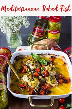 a casserole dish with meat and vegetables in it