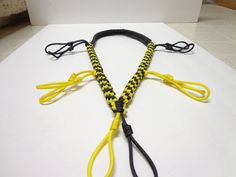 This lanyard is made from military grade 550 paracord in two colors black and yellow - This lanyard will give you the best of both worlds, it is stylish and you can show off your colors with it and it also does what it is there to do which is to keep your calls safe and secure throughout a hunt - The thick neck section of the lanyard will keep it comfortable while being around your neck for any period of time - This lanyard includes approximately 60 feet of paracord that can be taken apart and u Duck Call Lanyard Diy, Leather Duck Call Lanyard, Paracord Knife Lanyard, Duck Call Lanyard, Paracord Duck Call Lanyard, Knife Lanyard Paracord, Thick Neck, Duck Calls, 550 Paracord