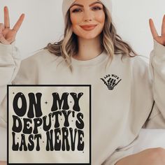 Deputy Wife Crewneck Sweatshirt is the perfect custom gift for a law enforcement officer's wife or wife to be!  T-shirt: This is made with the Bella & Canvas 3001 classic unisex jersey short sleeve tee.  It fits like a well-loved favorite, soft cotton and quality print make users fall in love with it over and over again. These t-shirts have-ribbed knit collars to bolster shaping. The shoulders have taping for better fit over time. Dual side seams hold the garment's shape for longer.  .: 100% Air Correctional Officer Wife, Blue Collar Wife, Deputy Wife, Wife To Be, Correctional Officer, Gift For Wife, Perfect Shirt, Sweatshirt Hoodie, Gifts For Wife